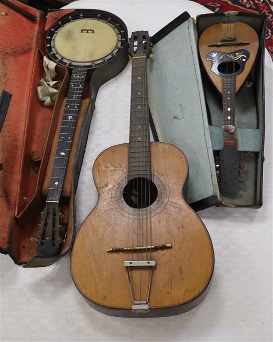 A banjo, mandolin and a guitar